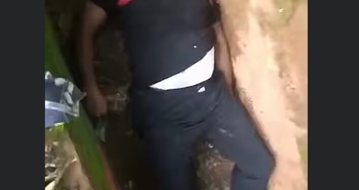 Man Killed And Dumped In A Gutter In Nkwelle, Anambra State (Graphic Photo)