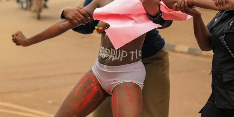 Topless Ugandan Women Protest Against Corruption