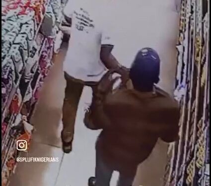 Grown Man Caught On CCTV Stealing 2 Packs Of Indomie In A Mall (Photos)