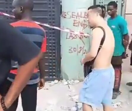 Chinese Man Tears Naira Notes After Lagos Govt Officials Sealed His Company (Video)