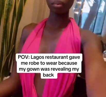 A Restaurant In Lagos Gave A Lady A Robe To Wear Due To Her Revealing Outfit (Photos, Video)