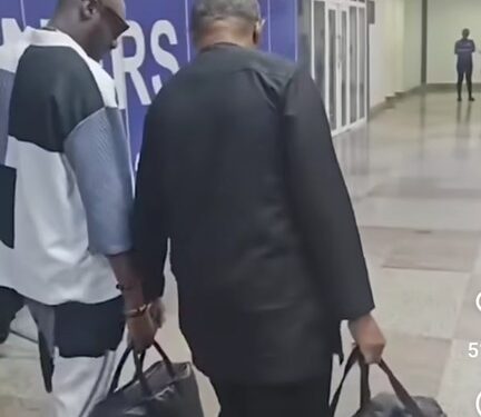 Peter Obi Carries 2Face Idibia’s Bag At Airport (Video, Photos)