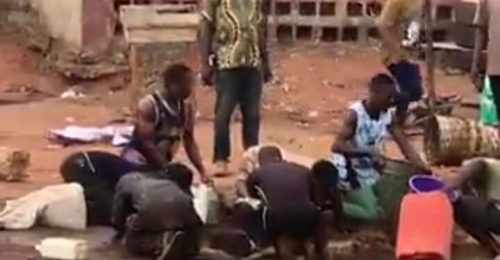 Nigerians Filmed Scooping Fuel From A Fallen Petrol Tanker In Onitsha