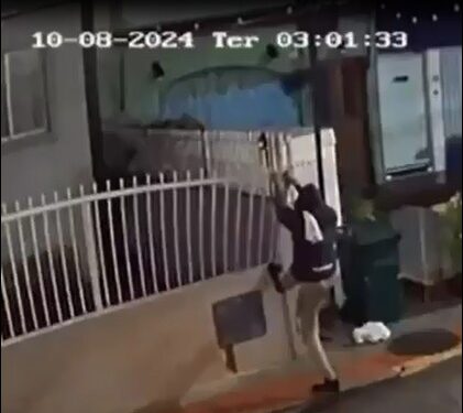 Thief Caught On Camera Stealing Entire Gate With Bare Hands (Photos)