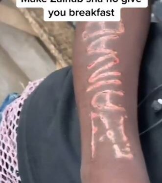 Male Pepper Seller Gets Girlfriend’s Name Carved On His Arm (Video)