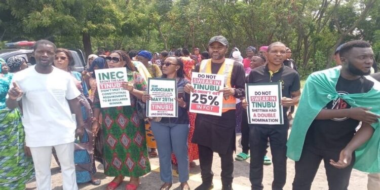 Tinubu: Protesters Storm Presidential Election Tribunal, Make Strong Demands (Photo)
