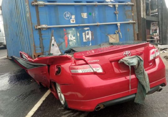 Container Crushes A Toyota Camry In Lagos (Photo)