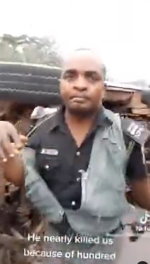Angry Commuters Confront Policeman For ‘Almost Causing Their Death Over N100’ (Video)