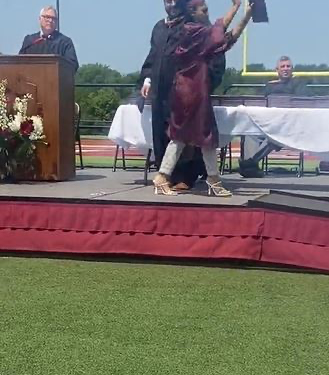 Excited Lady Dances Upon Receiving Degree