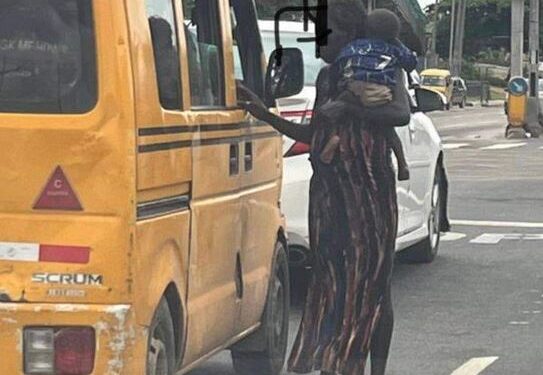 You Have A Baby You Can’t Cater For And You Are Pregnant With Another – Man Queries As He Shares Photo Of A Woman Begging With Her Child