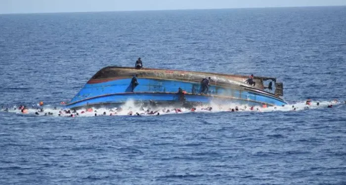 Tug Boat Piloting Barge Load Of Containers Sinks At Tin-Can Port