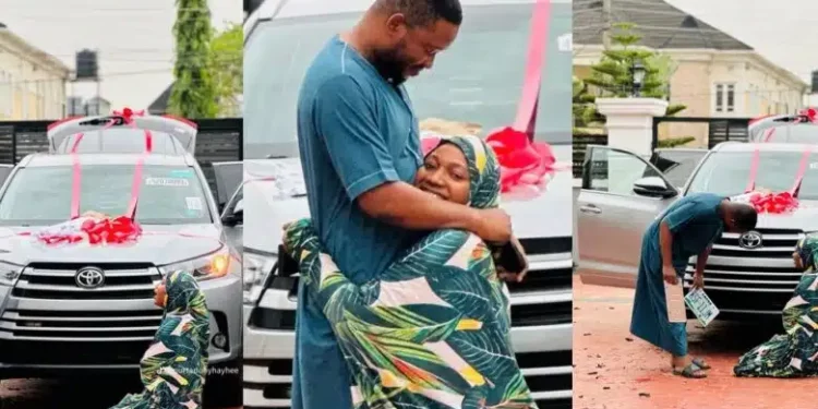 Heartwarming moment as Nigerian wife kneels in thanks as husband gifts new car