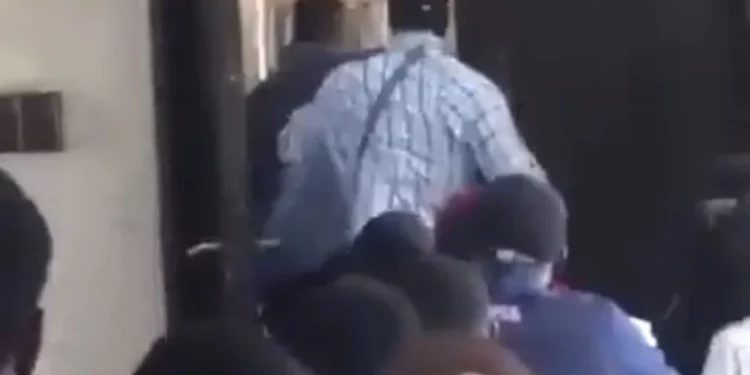 Outrage as Unilag student goes rogue, physically assaults his lecturer (video)