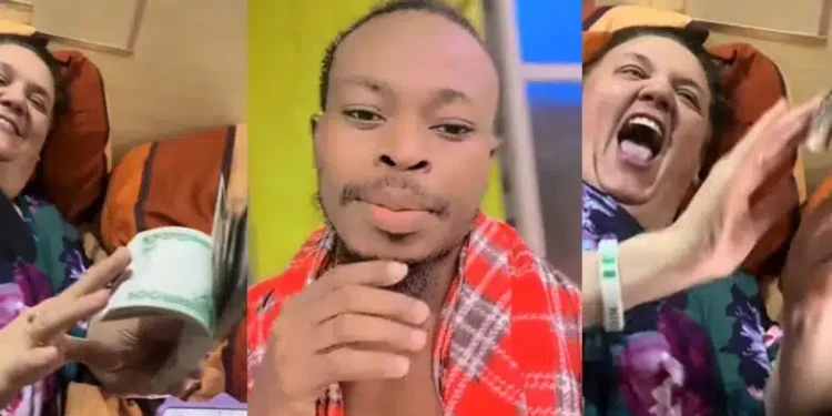 Nigerian man gushes as rich caucasian lover flaunts wad of Naira, hides it in gown for him to find