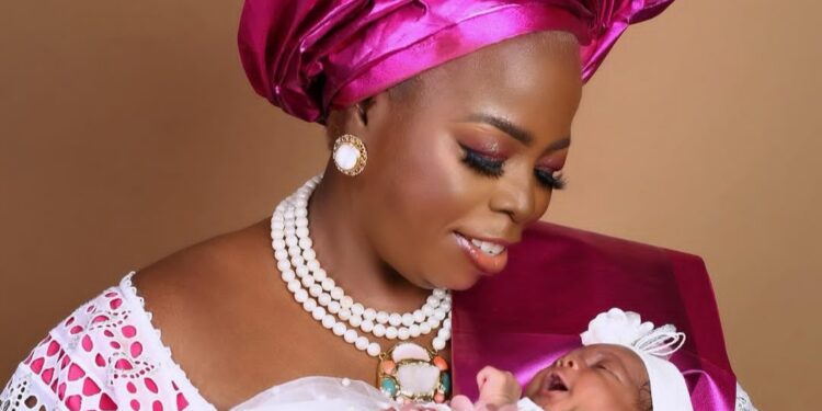 Nigerian woman celebrates as she welcomes first child after 28 years of waiting