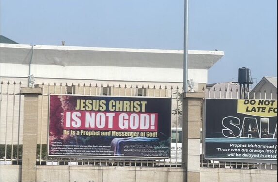 Actress Wumi Tuase frowns at a banner at Lekki Central Mosque