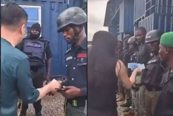 Viral video of Police officers collecting money from their Chinese bosses sparks criticism