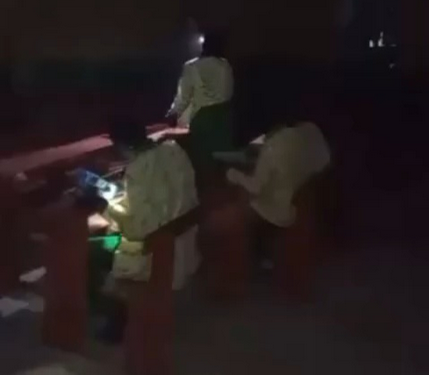 Outrage as students sit for WAEC exam at night with torch light in Asaba (video)