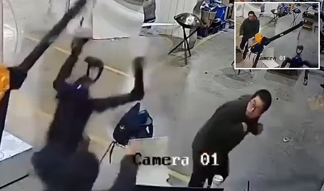 Chilling moment humanoid robot wakes up and starts attacking its handlers while trying to break free from restraints (video)