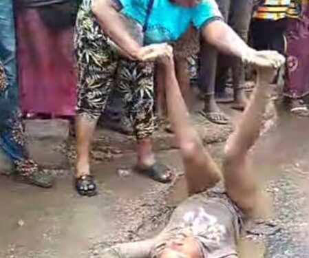 Drama as young woman suspected to be ‘drugged’ rolls in muddy water in Ogbomoso (video)
