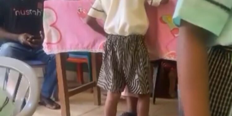 Troubling video shows nursery school teacher slapping little boy multiple times while teaching him to write in Lagos