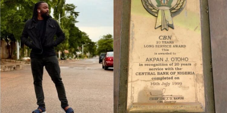 ”My father worked”- Man displays award late father received from CBN in 1999 after 20 years of service