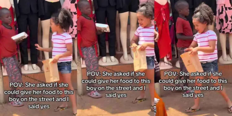 Adorable moment little girl offers her food to boy on the street