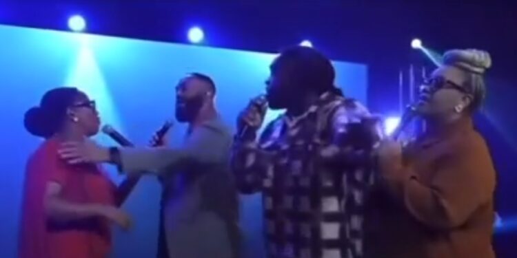 Choristers clash on stage during church service in viral video
