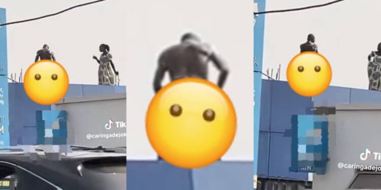 Man seen bathing publicly on a bank rooftop (video)