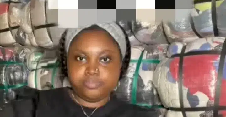 Thrift vendor rants as she finds sign-out shirt inside imported bale of clothes