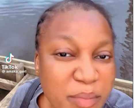 Lady reveals that people move around in canoes when it rains in her neighbourhood in Lagos