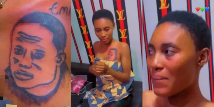 Lady tattoos boyfriend’s face on her chest to prove her love