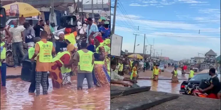 Lord’s Chosen members worship in flooded pothole, sparks outrage