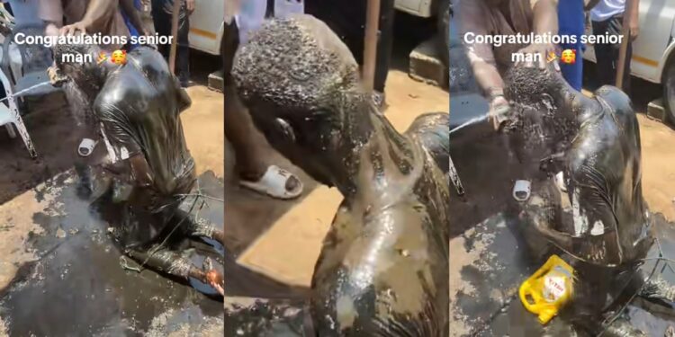Mechanic apprentice’s graduation celebrated with black engine oil bath in trending video