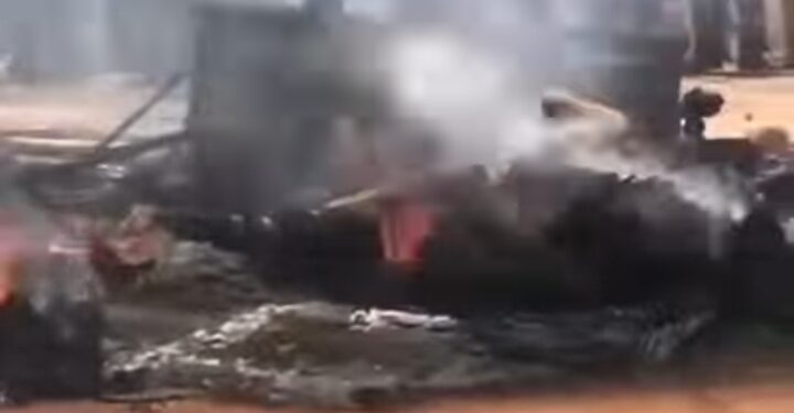 Mob Sets Over 10 People Ablaze After Being Found With Guns In Edo (Photos)