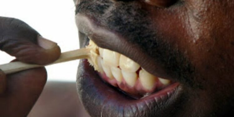 Nigerians Dump Toothpastes Turn To Chewing Sticks As Economic Hardship Bites