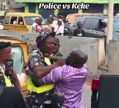 Police Officer And Keke Driver Strangle Each Other On Busy Road (Photos)