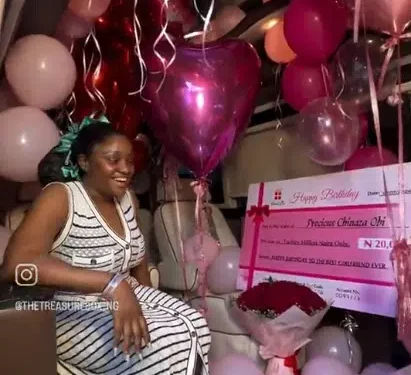 Lady over the moon as man surprises her with N20 million cheque on her birthday