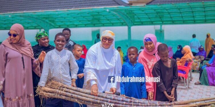 Wife of House of Reps member trends amid reports she shared sugar cane to “empower” youths in her community