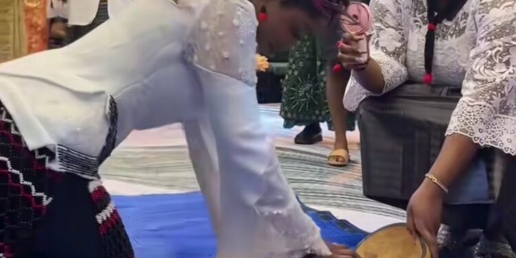 Bride goes viral on wedding day as family tests her cooking skills with grinding stone