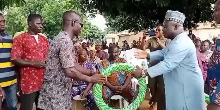 Kogi lawmaker empowers constituents by gifting them one motorcycle tyre each (video)