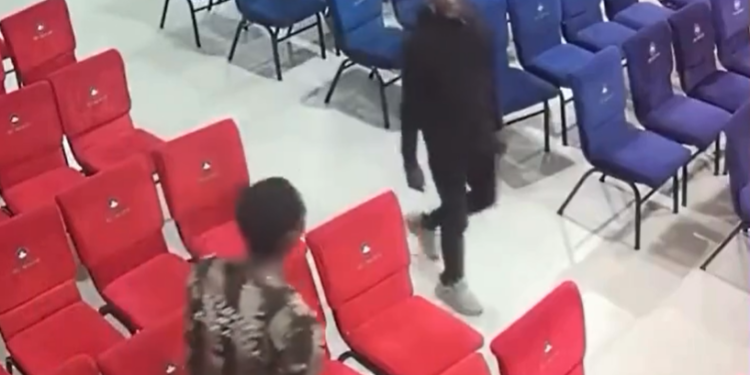Thief caught on CCTV stealing a new member’s phone in church (video)