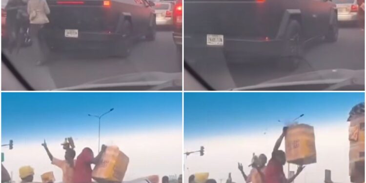 Street traders swamp around Tesla Cybertruck spotted on a road in Lagos (video)