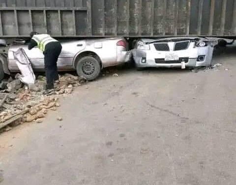 Eight pupils returning from graduation ceremony escape death as container falls on two cars in Kogi