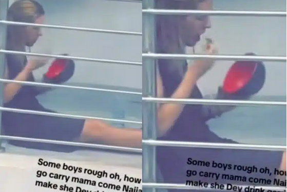 Caucasian lady captured smoking a bowl garri on balcony (video)