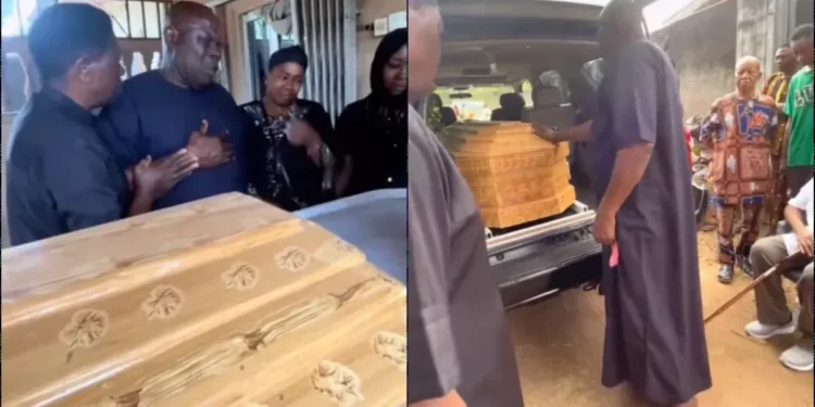 Viral video of father weeping as he lays first daughter to rest after health complication